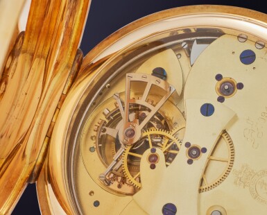 View full screen - View 1 of Lot 44. An exceedingly rare yellow gold open-faced two-train keyless one-minute tourbillon watch with trip quarter repetition and Kew A rating, No. 09428, 1911-12.