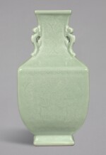 A RARE CELADON-GLAZED INCISED 'LOTUS' ARCHAISTIC SQUARE VASE, QIANLONG INCISED SEAL MARK AND PERIOD | 清乾隆 粉青釉刻纏枝蓮紋夔龍耳四方尊 《大清乾隆年製》款
