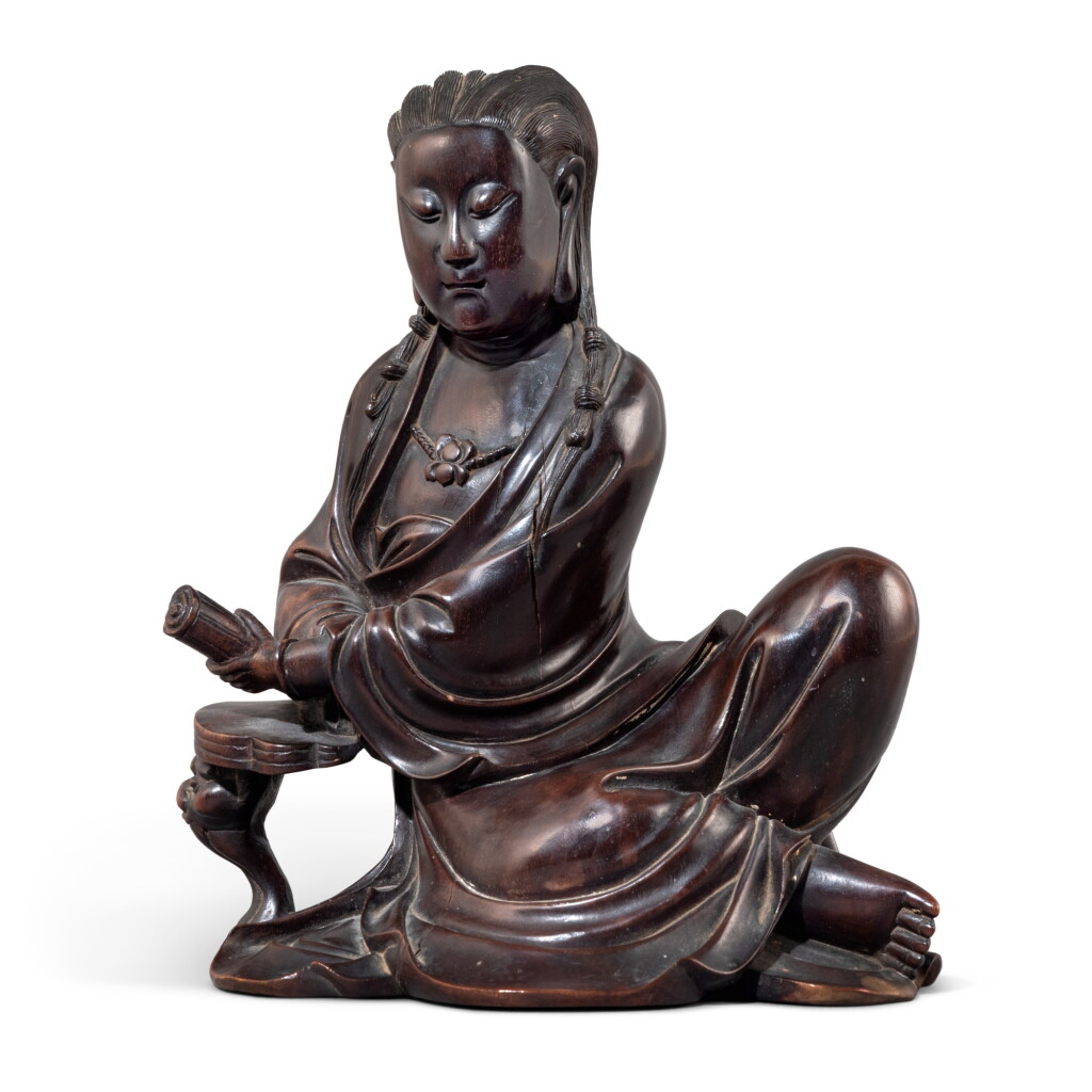 View full screen - View 1 of Lot 61. A boxwood carving of Guanyin, Qing dynasty, 18th / 19th century.