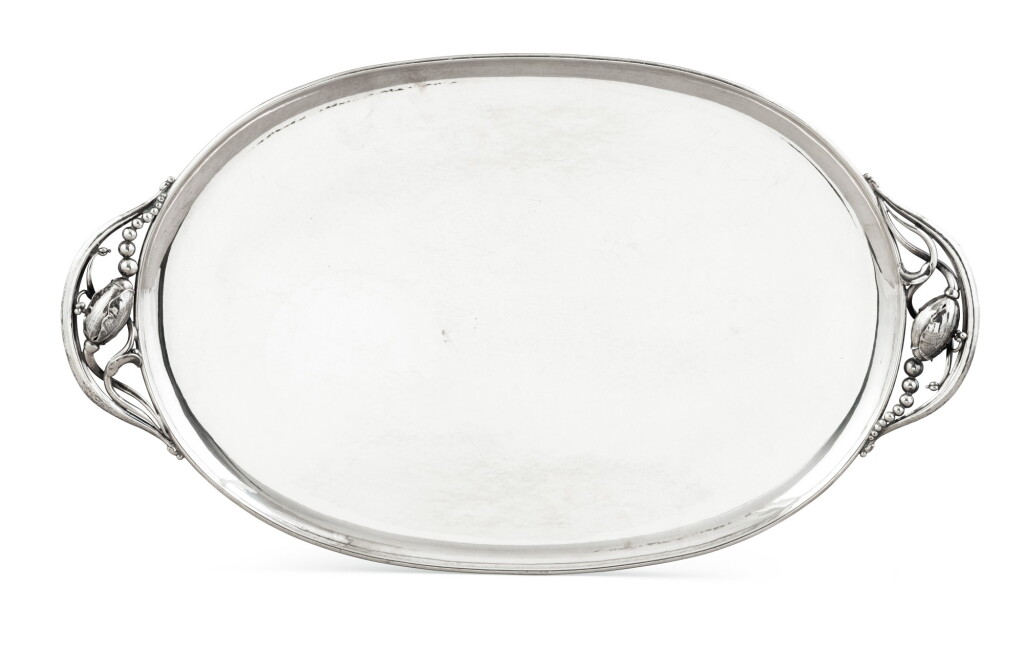 View full screen - View 1 of Lot 39. A Danish silver oval tray, Blossom pattern, Jensen, Copenhagen, after 1935 | Plateau ovale en argent, modèle Blossom par Jensen, Copenhague, après 1935.