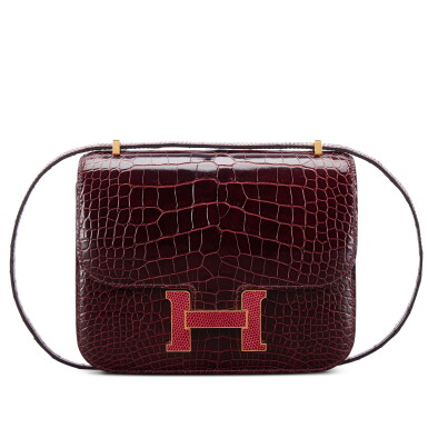 View full screen - View 1 of Lot 623. Limited Edition Bourgogne Shiny Mississippiensis Alligator Mini Constance 18 Rouge Moyen Lizard and Gold Hardware, 2015.