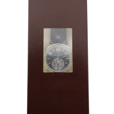 View full screen - View 1 of Lot 71. PATEK PHILIPPE | REFERENCE 5960P A PLATINUM AUTOMATIC ANNUAL CALENDAR FLY BACK CHRONOGRAPH WRISTWATCH WITH POWER RESERVE, DAY/NIGHT INDICATION AND REGISTERS, FACTORY SEALED, MADE IN 2006.