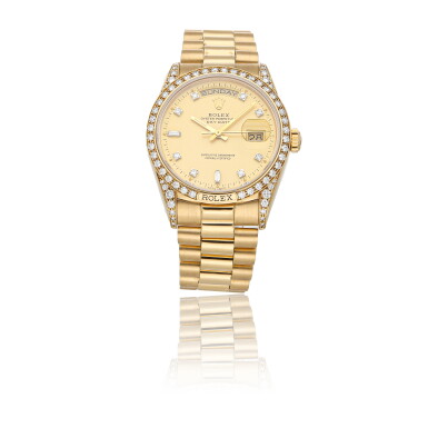 View full screen - View 1 of Lot 9. ROLEX | DAY-DATE 118388, A YELLOW GOLD AUTOMATIC WRISTWATCH WITH BAGUETTE DIAMOND DIAL AND DIAMOND BEZEL CIRCA 1985.