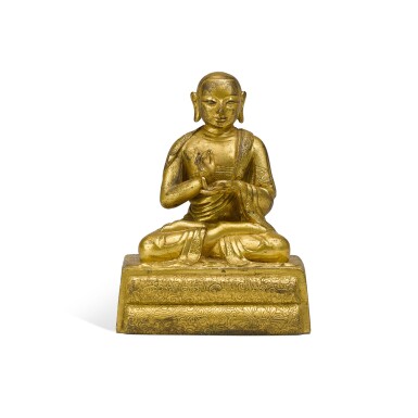 View full screen - View 1 of Lot 253. A small gilt bronze figure of a Lama, Qing dynasty, 18th century | 清十八世紀 鎏金銅喇嘛坐像.