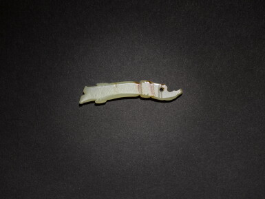 View full screen - View 1 of Lot 10. A white jade 'fish-dragon' pendant, Western Zhou dynasty.