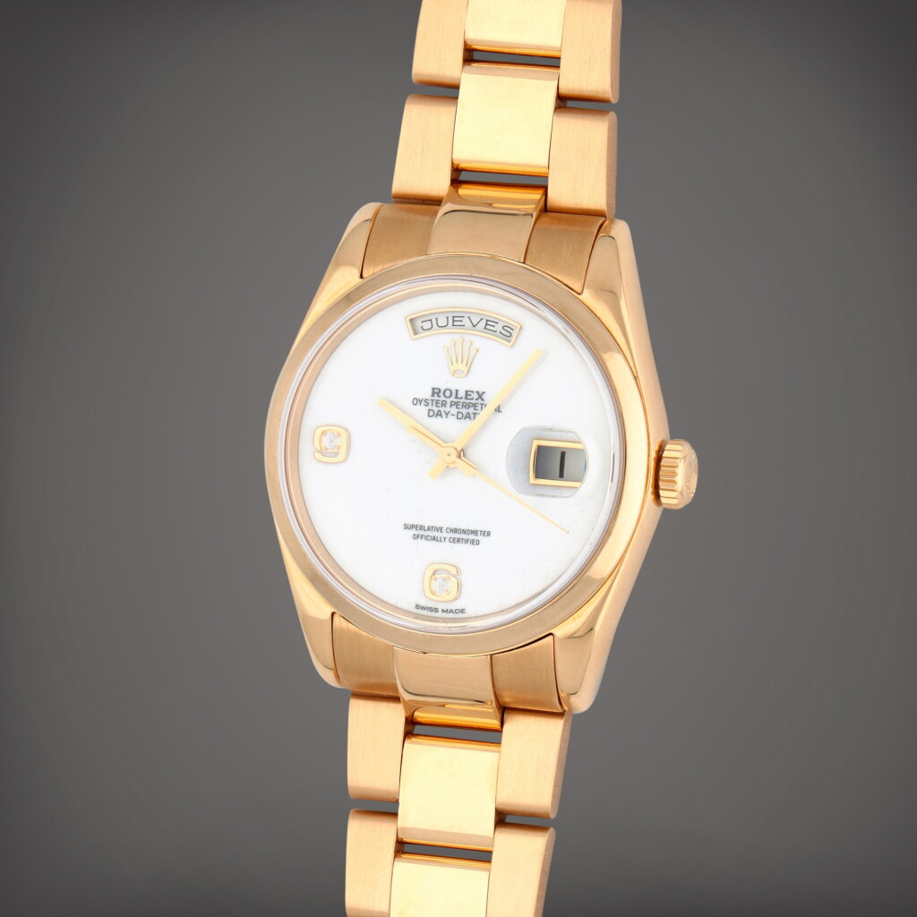 View full screen - View 1 of Lot 47. Day-Date, Reference 118208 A yellow gold and diamond-set wristwatch with day, date, bracelet and cacholong dial Circa 2001.