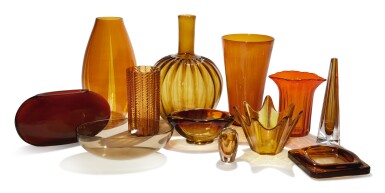 View full screen - View 1 of Lot 54. ARTIST UNKNOWN | GROUP OF TWELVE ORANGE AND BROWN GLASS OBJECTS.