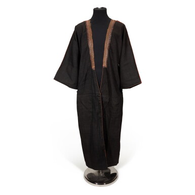 View full screen - View 1 of Lot 93. LAWRENCE | Black wool and cotton Zebun, or outer robe, believed to have been owned by Lawrence.