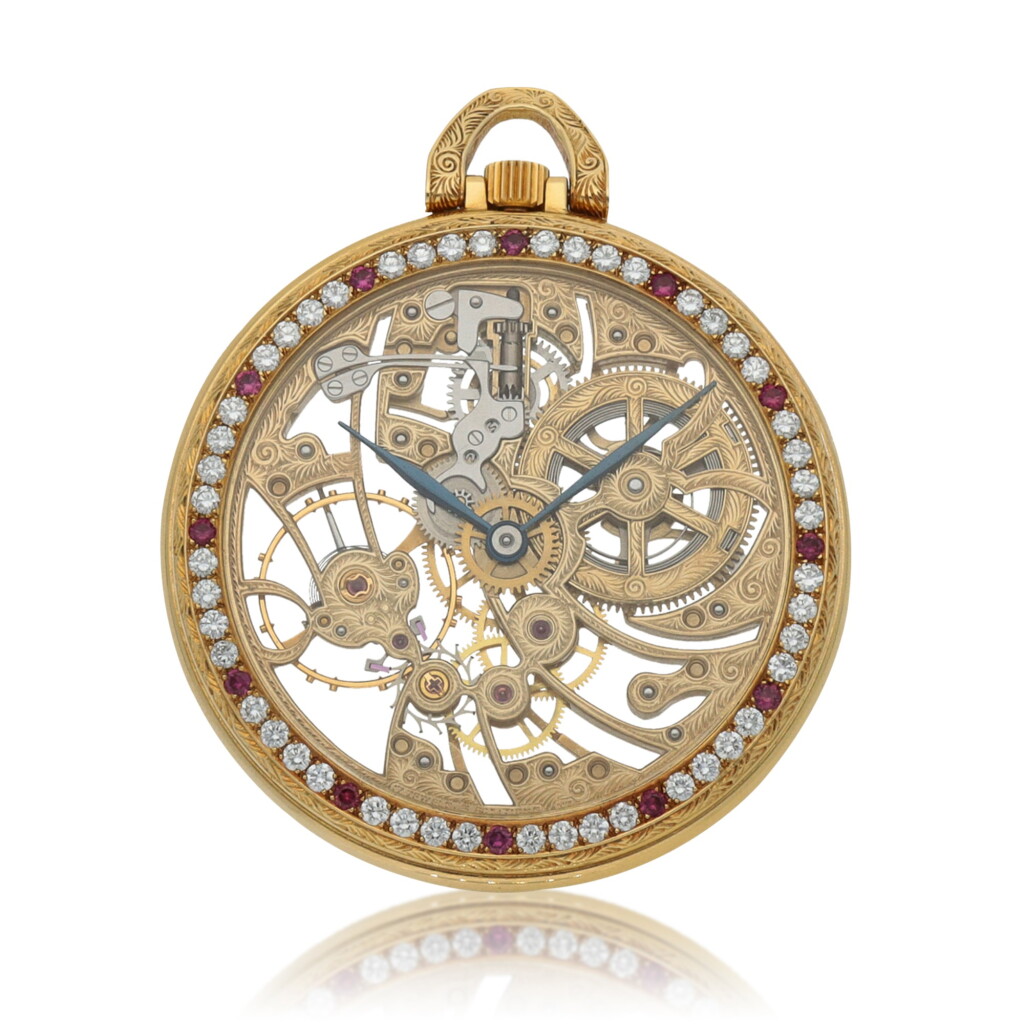View full screen - View 1 of Lot 62. Retailed by Royama Yellow gold, diamond and rubies-set skeletonized open-faced watch Circa 1980 | Gérald Genta | 黃金鑲鑽石及紅寶石鏤空懷錶,零售商為Royama,年份約1980.