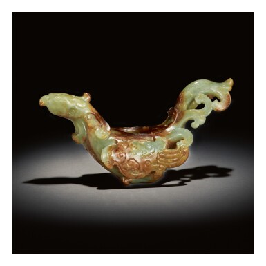 View full screen - View 1 of Lot 256. A RARE GREEN AND BROWN JADE ARCHAISTIC PHOENIX-FORM WATERPOT, MING DYNASTY.