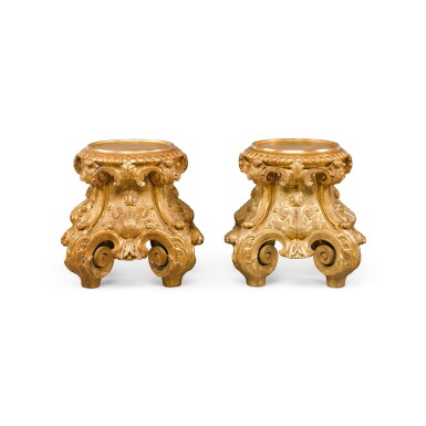 View full screen - View 1 of Lot 252. A pair of Régence style carved giltwood urn stands.