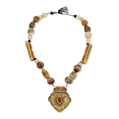 View full screen - View 1 of Lot 76. A Gold and Gem-Set Pendant, Probably Afghanistan, Early 20th Century.