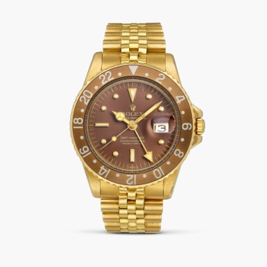 View full screen - View 1 of Lot 2126. GMT-Master “Nipple Dial”, Reference 1675 | A yellow gold dual time wristwatch with date and bracelet, Circa 1971.