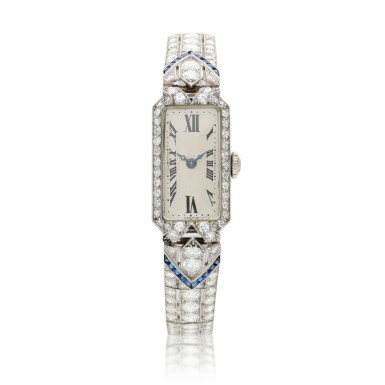 View full screen - View 1 of Lot 194. A platinum, diamond and sapphire set bracelet watch, Circa 1940.