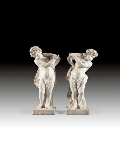 View full screen - View 1 of Lot 80. A pair of marble atlantes of Hercules and Iphicles | Paire d'Atlantes en marbre figurant Hercule et Iphiclès.