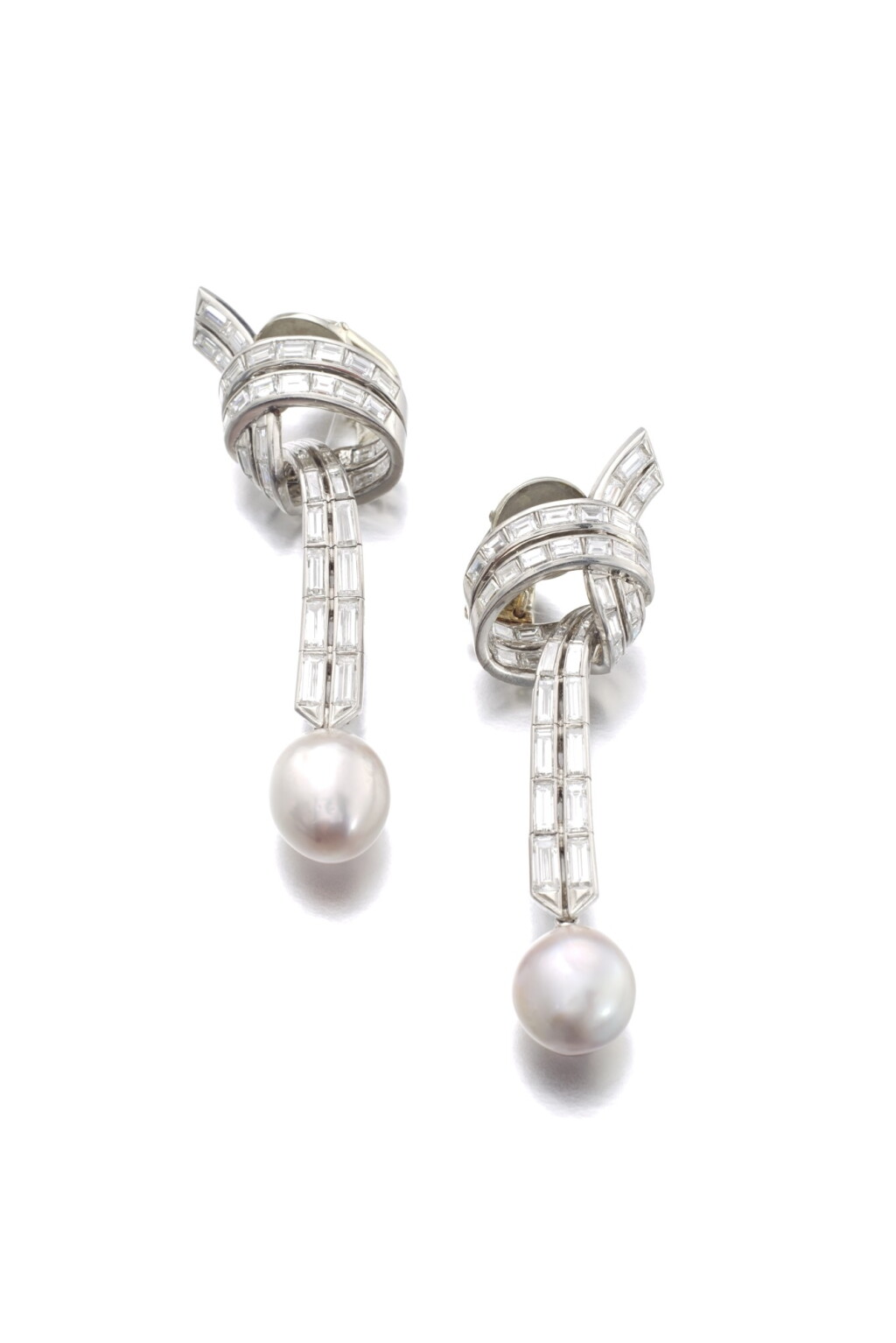 View full screen - View 1 of Lot 427. STERLÉ | PAIR OF NATURAL PEARL AND DIAMOND EAR CLIPS, 1950S.