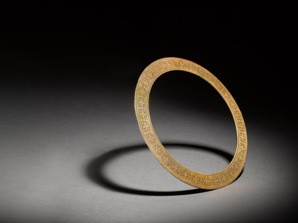 View full screen - View 1 of Lot 625. A Sikh gold damascened steel quoit (chakram), North India, Punjab, 19th century.