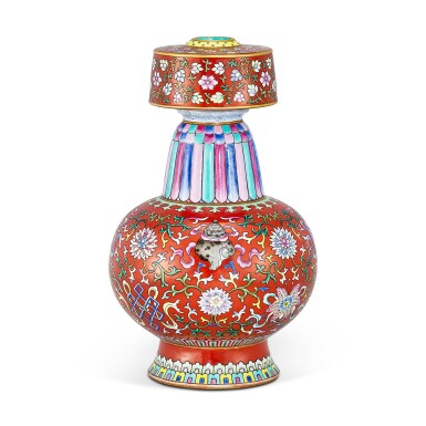 View full screen - View 1 of Lot 459. A FINE AND EXTREMELY RARE CORAL-RED GROUND FAMILLE-ROSE ALTAR VASE SEAL MARK AND PERIOD OF QIANLONG | 清乾隆 粉彩珊瑚紅地番蓮八吉祥紋賁巴壺 《大清乾隆年製》款 .