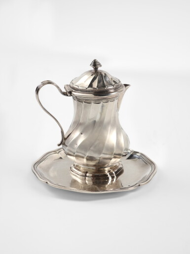 View full screen - View 1 of Lot 564. A Louis XV Silver Creamer or Mustard Pot and Stand, Jean Gailhard, Toulouse, 1762-63.