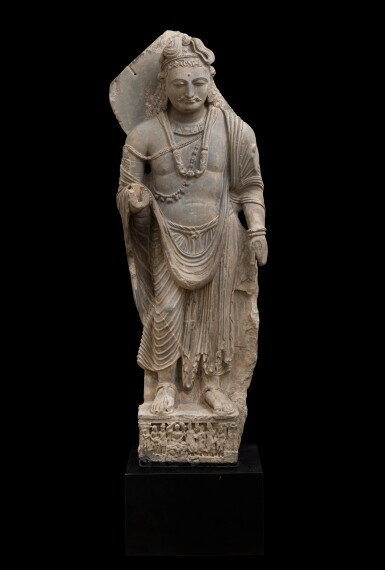 View full screen - View 1 of Lot 571. A large gray schist figure of Maitreya, Ancient Region of Gandhara, circa 3rd century.