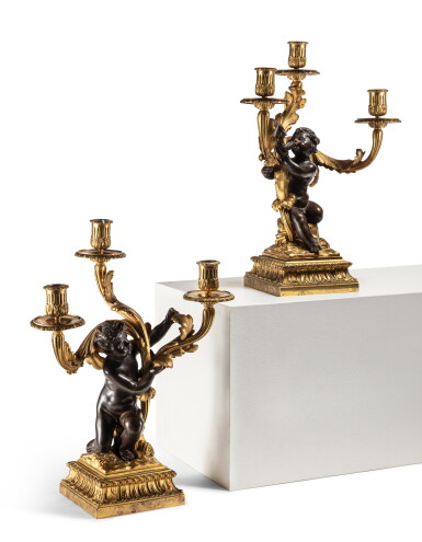 View full screen - View 1 of Lot 158. A pair of Louis XVI gilt and patinated bronze three-light candelabra, circa 1785.