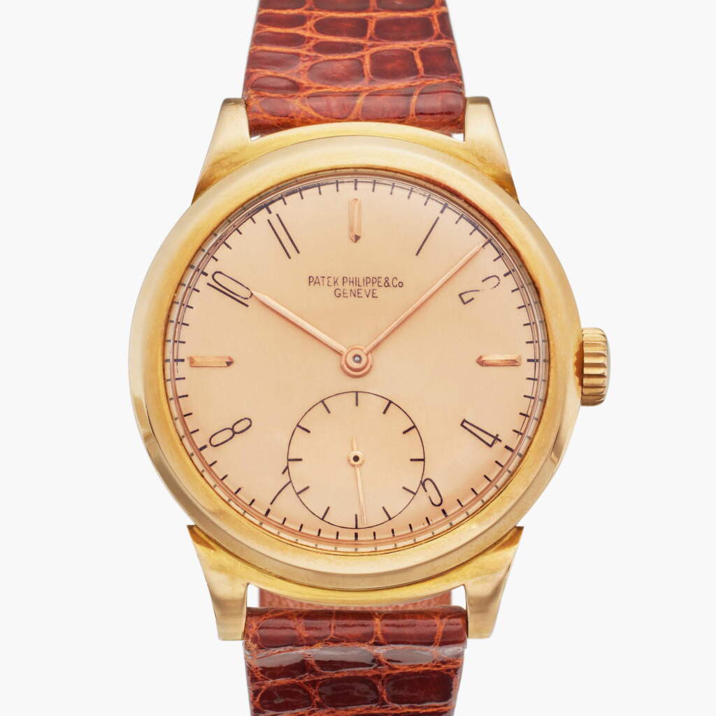 View full screen - View 1 of Lot 37. Reference 1491 'Ricciolo Pink on Pink' | A rare and fine pink gold wristwatch with scroll lugs, Made in 1944.