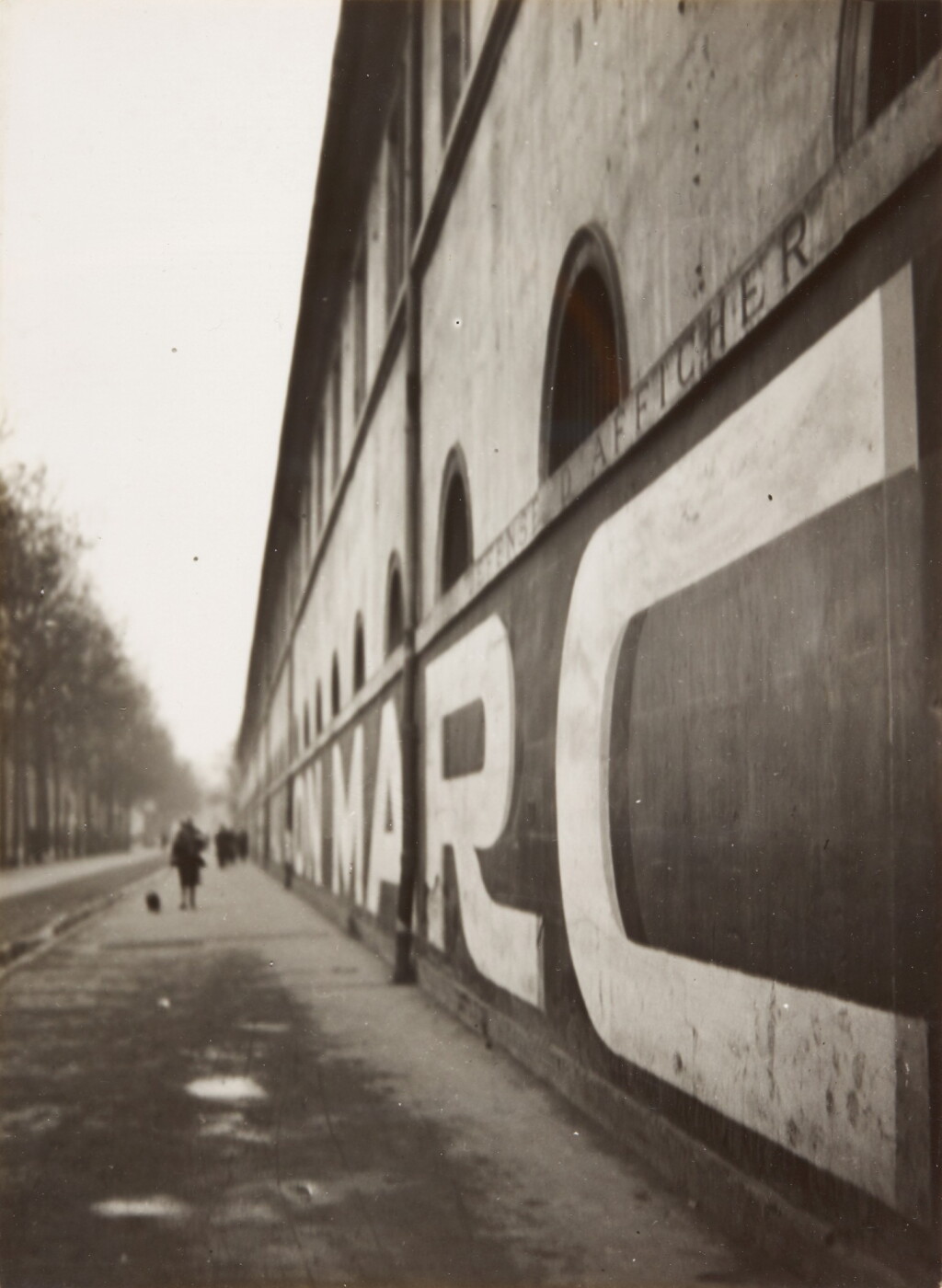 View full screen - View 1 of Lot 25. ANDRÉ KERTÉSZ | 'LE MUR DE L'ÉCOLE MILITAIRE', 1926.