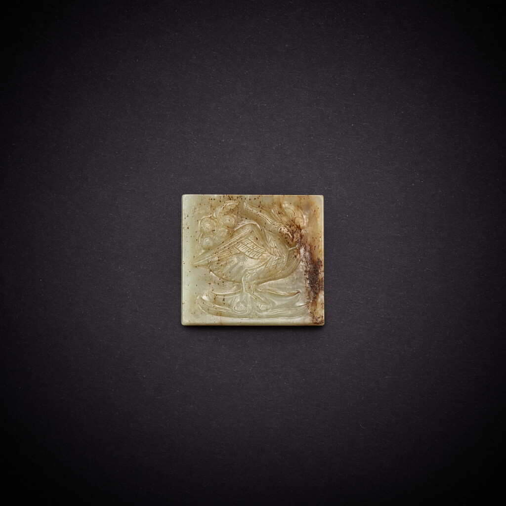 View full screen - View 1 of Lot 3526. A white jade 'phoenix' belt plaque, Liao dynasty | 遼 白玉鳳紋帶板.
