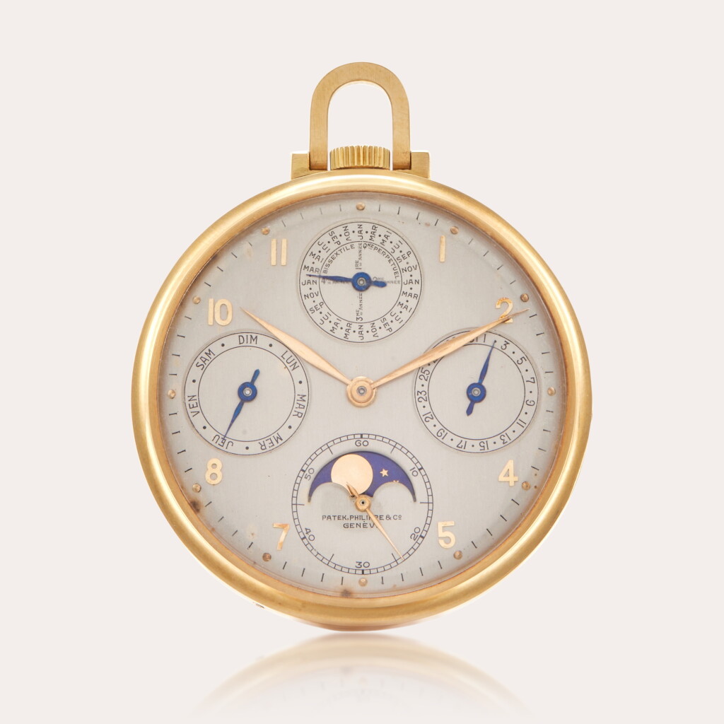 View full screen - View 1 of Lot 120. Reference 725 | A very fine gold open-faced perpetual calendar keyless lever watch with moon phases | Made in 1941.