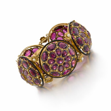 View full screen - View 1 of Lot 220. A garnet and seed pearl bracelet .