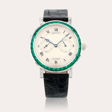 View full screen - View 1 of Lot 69. A magnificent and large special order 18ct white gold, emerald- and diamond-set minute repeating wristwatch.