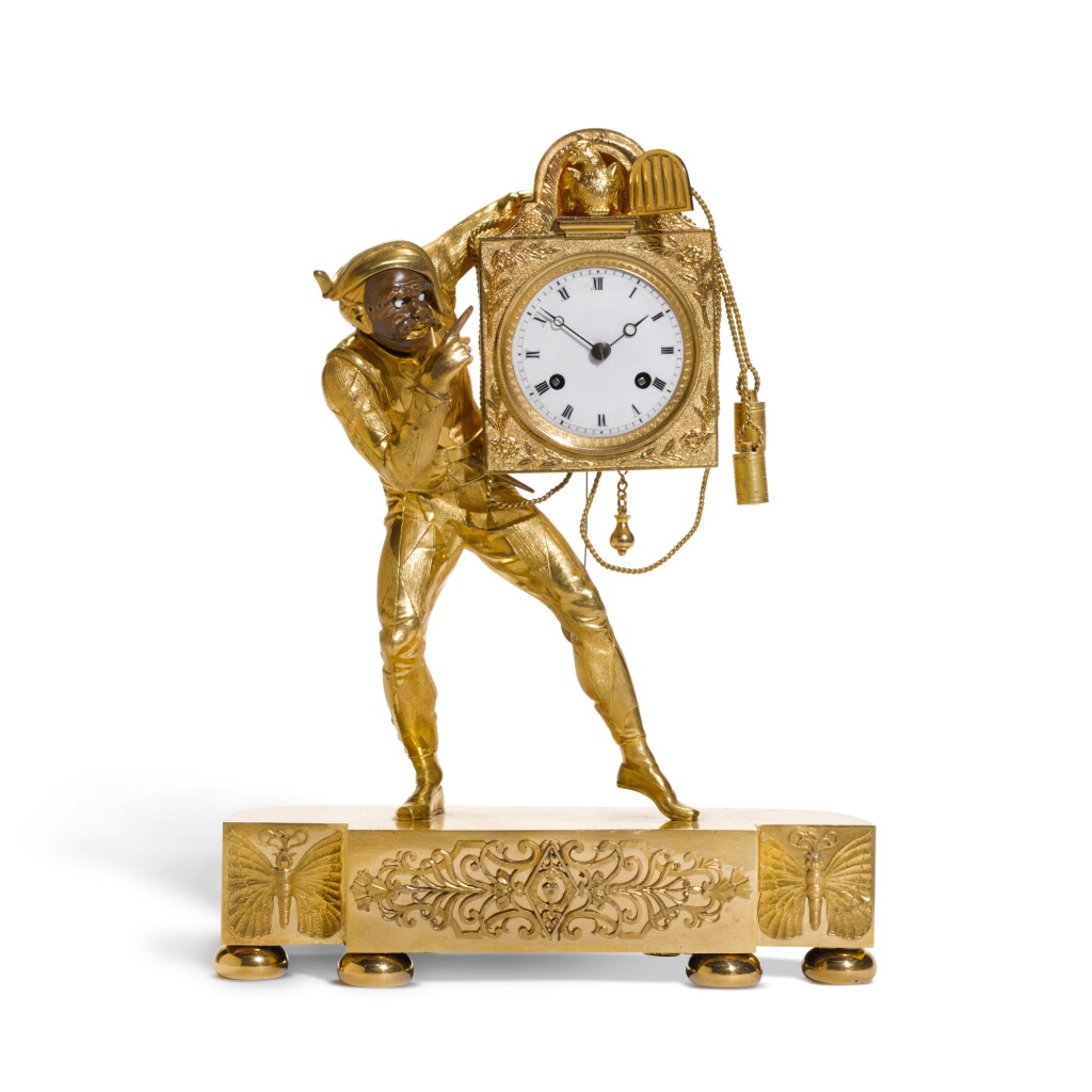View full screen - View 1 of Lot 62. An Empire ormolu and patinated bronze 'Harlequin' mantel clock, circa 1815.