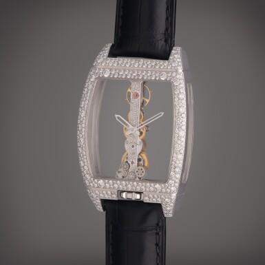 View full screen - View 1 of Lot 576. Reference 113.358.69/0F01 0000 Golden Bridge | A white gold and diamond-set skeletonized wristwatch, Circa 2020.