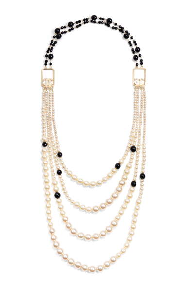 View full screen - View 1 of Lot 32. Ivory and Black Resin Pearl Multi Strand CC Logo Necklace, Cir 2010.