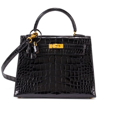 View full screen - View 1 of Lot 670. Black Shiny Alligator Mississippiensis Kelly 25 Sellier Gold Hardware, 1997.