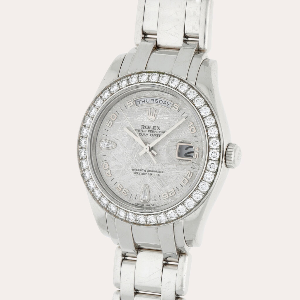 View full screen - View 1 of Lot 225. Day-Date Pearlmaster, Reference 18946 | A platinum and diamond-set wristwatch with day, date, bracelet and meteorite diamond-set dial | Circa 2005.