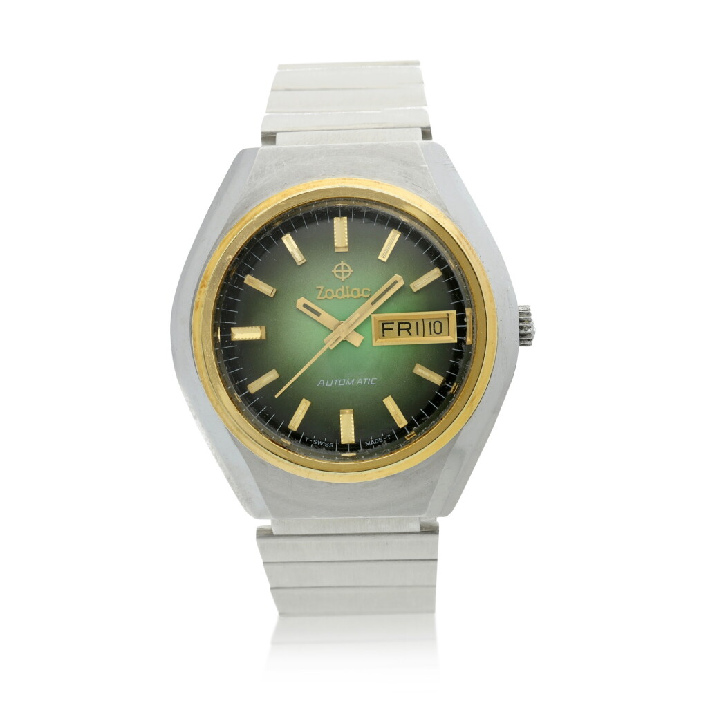View full screen - View 1 of Lot 200. A stainless steel and yellow gold automatic wristwatch with day and date, Circa 1970.