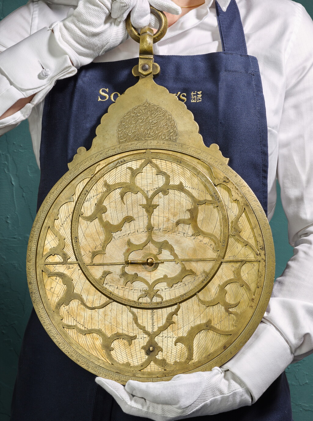 View full screen - View 1 of Lot 164. A monumental highly important brass astrolabe commissioned for Aqa Afzal, made by Qaim Muhammad and Muhammad Muqim, India, dated Rabi' al-Awwal 1021 AH/May 1612 AD.