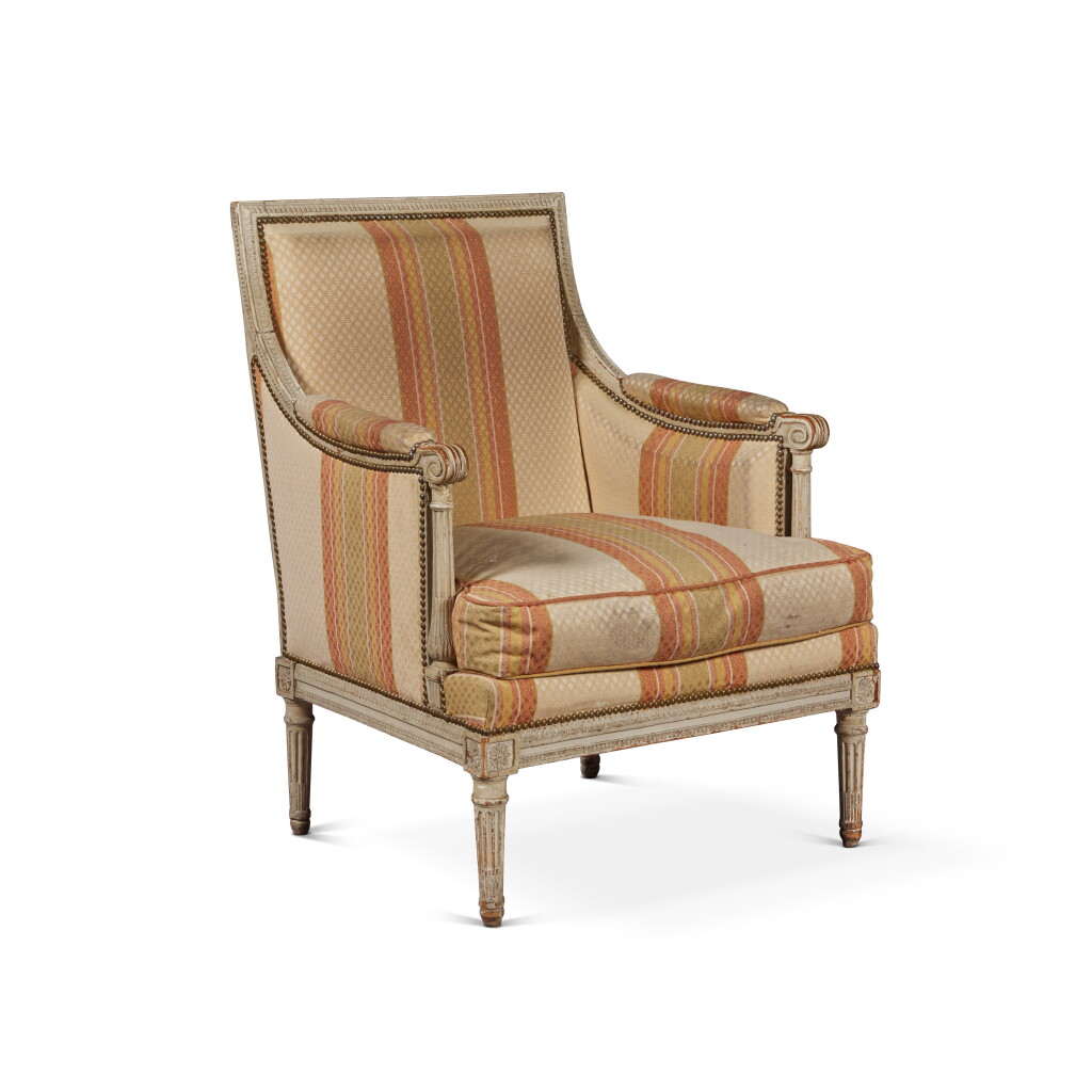 View full screen - View 1 of Lot 101. A Royal Louis XVI Carved and Grey-Painted Bergère from the Château de Fontainebleau by Georges Jacob, Circa 1785.