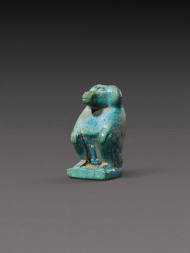 View full screen - View 1 of Lot 117. An Egyptian Turquoise Faience Figure of a Baboon, 12th/13th Dynasty, 1938-1640 B.C..