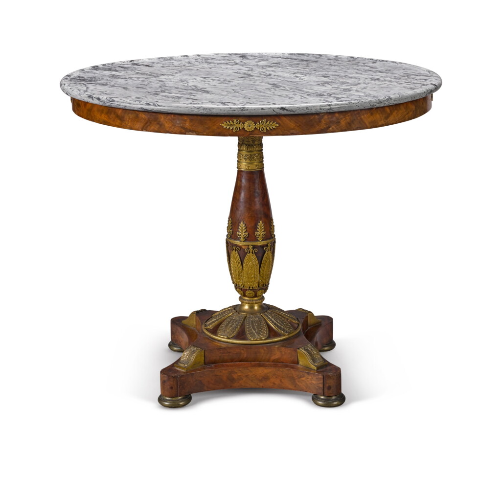 Voir en plein écran - Voir 1 du lot 83. An Empire gilt-bronze mounted mahogany guéridon, early 19th century, attributed to Alexandre Maigret.