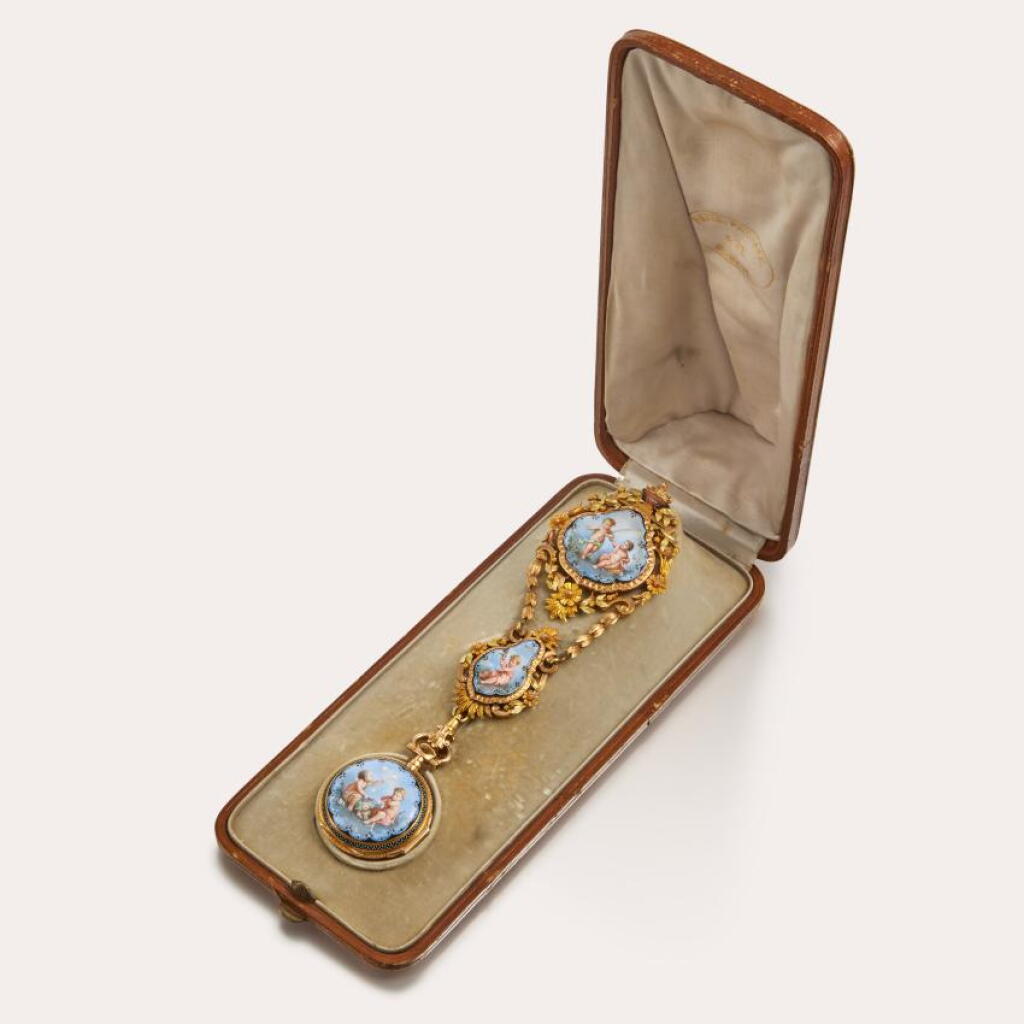 View full screen - View 1 of Lot 182. A very rare and fine 18ct yellow and pink gold, polychrome enamel painted hunting cased keyless lever watch with matching threecolour gold and enamel chatelaine and original fitted box, Circa 1870-75.