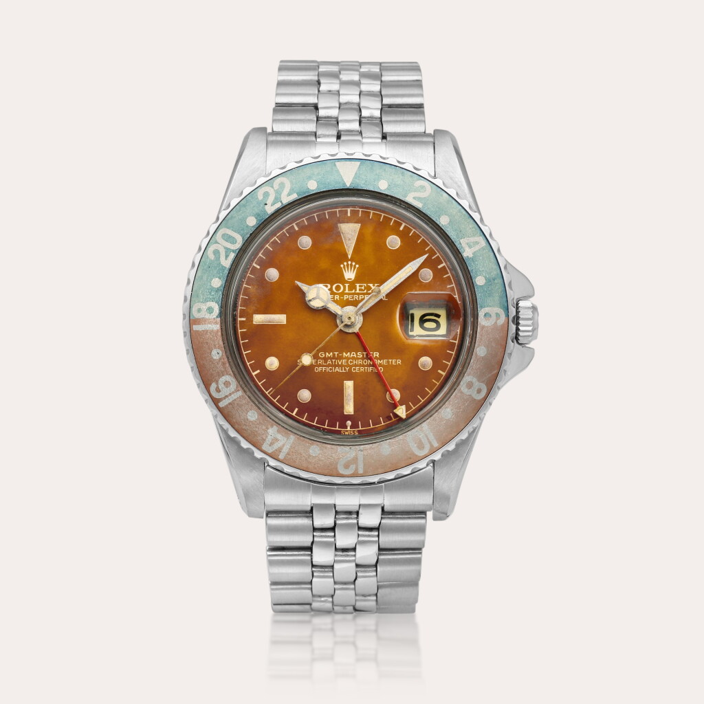 View full screen - View 1 of Lot 2290. GMT-Master “Pepsi Tropical Exclamation Point PCG”, Reference 1675 | A stainless steel dual time wristwatch with date, tropical dial and bracelet, Circa 1960.