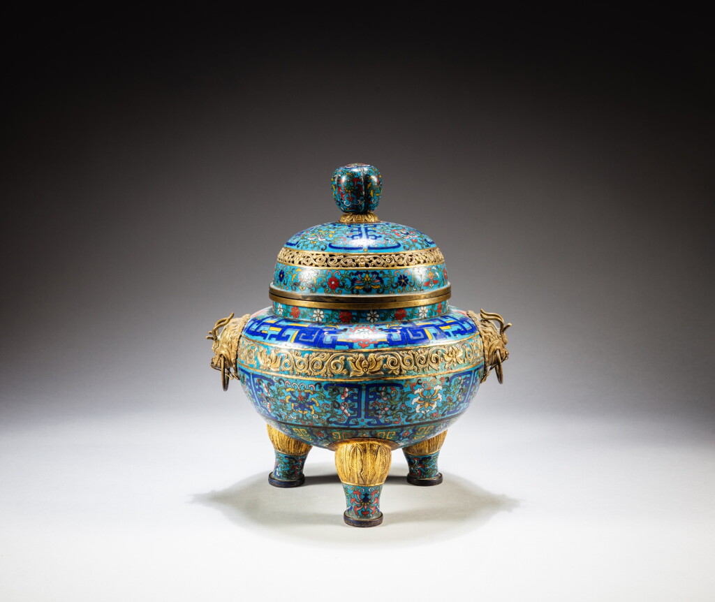 View full screen - View 1 of Lot 152. A gilt-bronze and cloisonné enamel incense burner and cover, Qing dynasty, 19th century | 清十九世紀 掐絲琺瑯纏枝蓮紋朝冠耳三足爐配蓋.