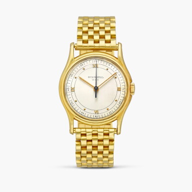 View full screen - View 1 of Lot 2371. Calatrava, Reference 1527 | A yellow gold wristwatch with bracelet, Circa 1946.