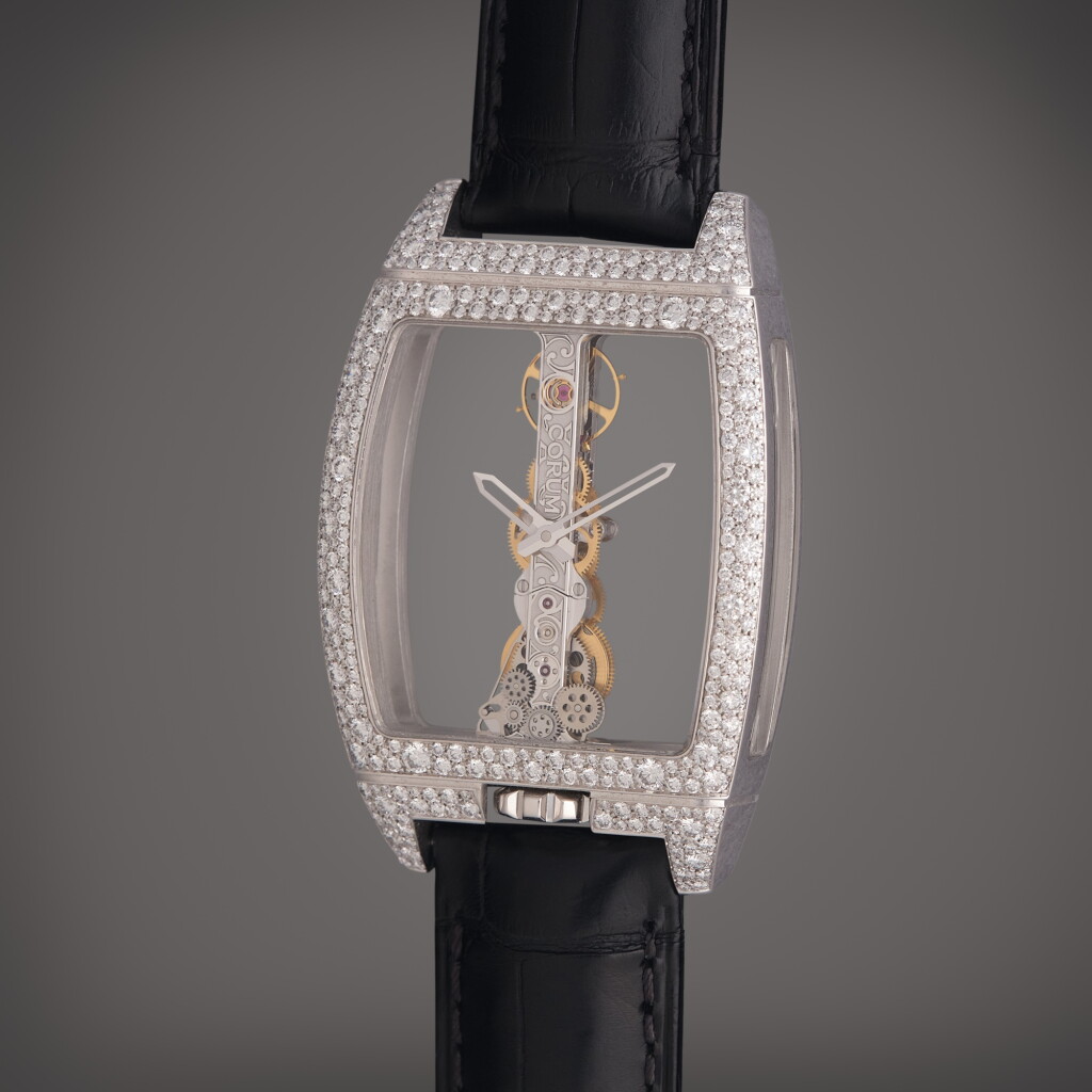 View full screen - View 1 of Lot 576. Reference 113.358.69/0F01 0000 Golden Bridge | A white gold and diamond-set skeletonized wristwatch, Circa 2020.