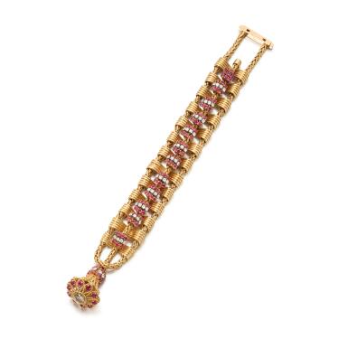 View full screen - View 1 of Lot 1097. Gold, ruby and diamond bracelet, circa 1959.