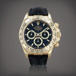 Daytona, reference 16518 Montre bracelet chronographe en or jaune | Yellow gold chronograph wristwatch avec bracelet Vers 1998 | Circa 1998