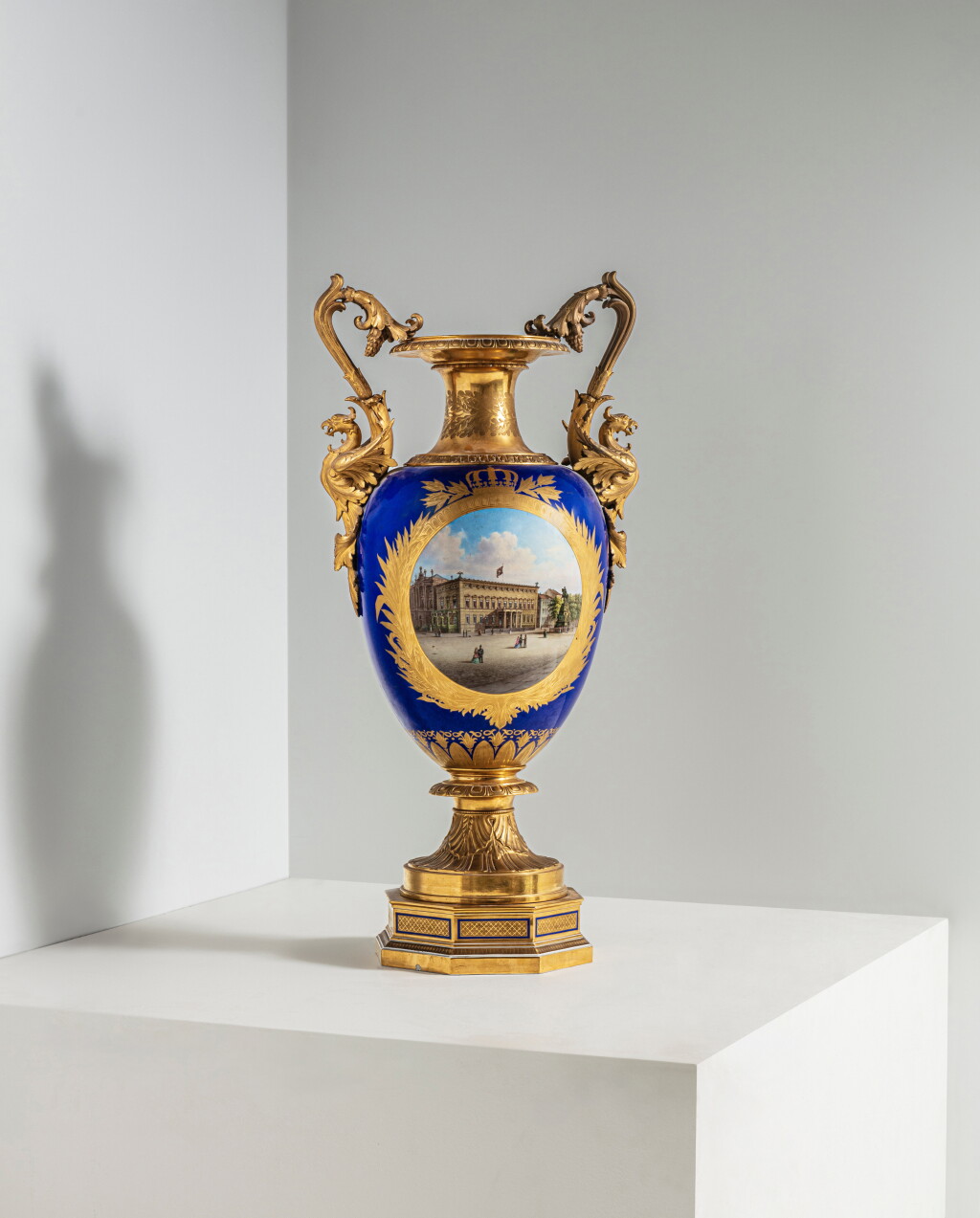 View full screen - View 1 of Lot 31. A Berlin (K.P.M.) porcelain blue-ground two-handled topographical vase, 'Victoria Vase', circa 1860-1870.