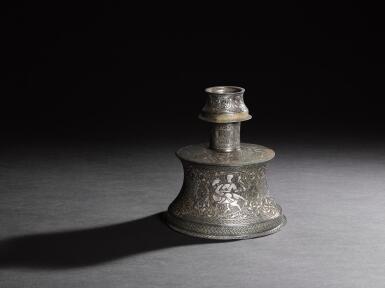 View full screen - View 1 of Lot 545. A gold and silver-inlaid bronze candlestick, east Anatolia or Jazira, 13th century.